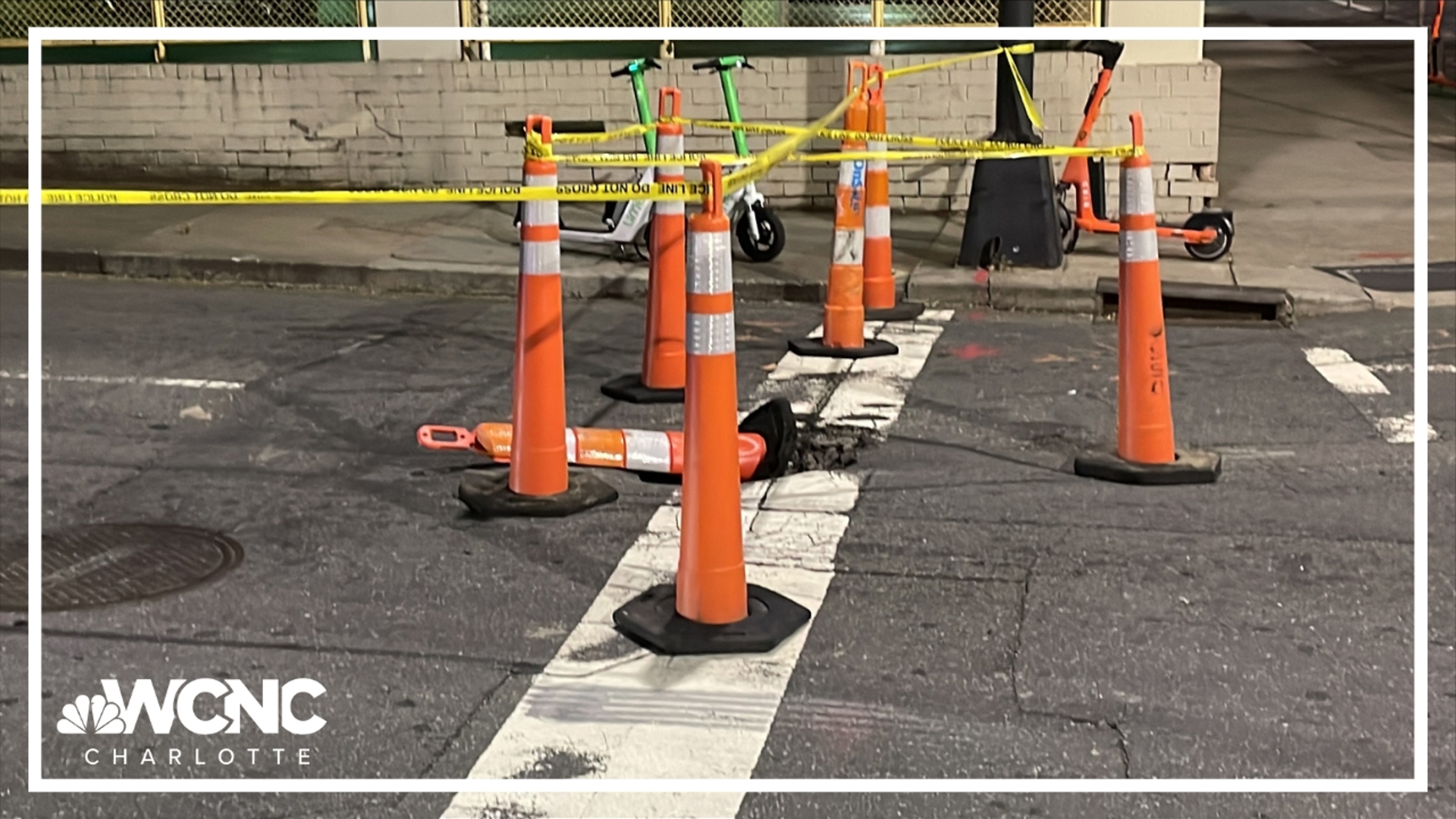 Church Street has two lanes closed near the intersection with Fourth street due to what CMPD called a sinkhole.