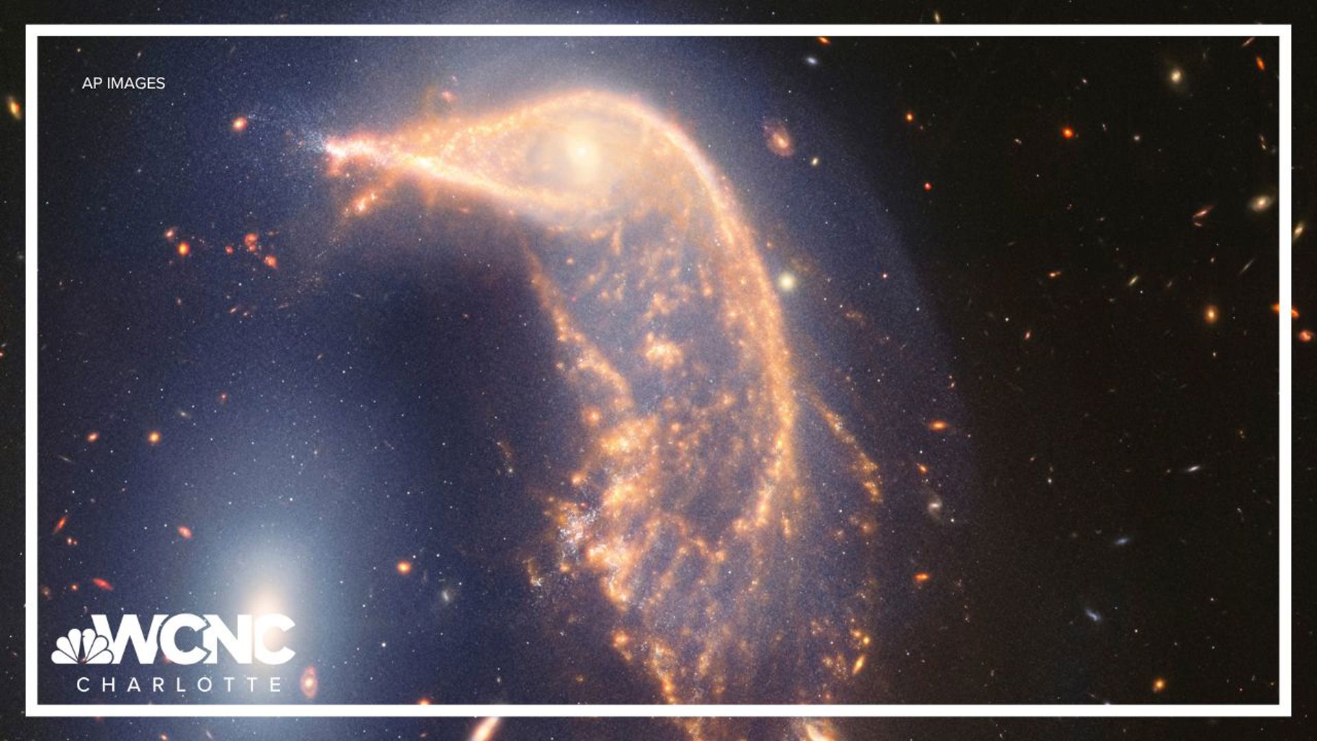 NASA says the neighboring galaxies, nicknamed Penguin and the Egg, have been tangled up for tens of millions of years.