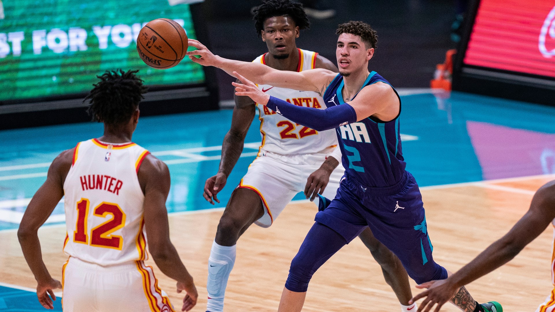 LaMelo Ball had 22 points, 12 rebounds and 11 assists to become youngest player in NBA history to record a triple-double, and the Hornets beat the Atlanta Hawks.