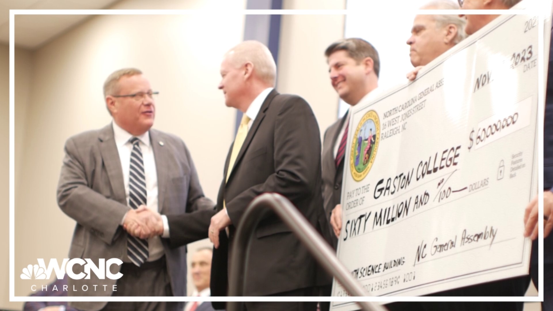 NC House Speaker Tim Moore and other state representatives traveled to Gaston College to present the school with a check for $60 million.