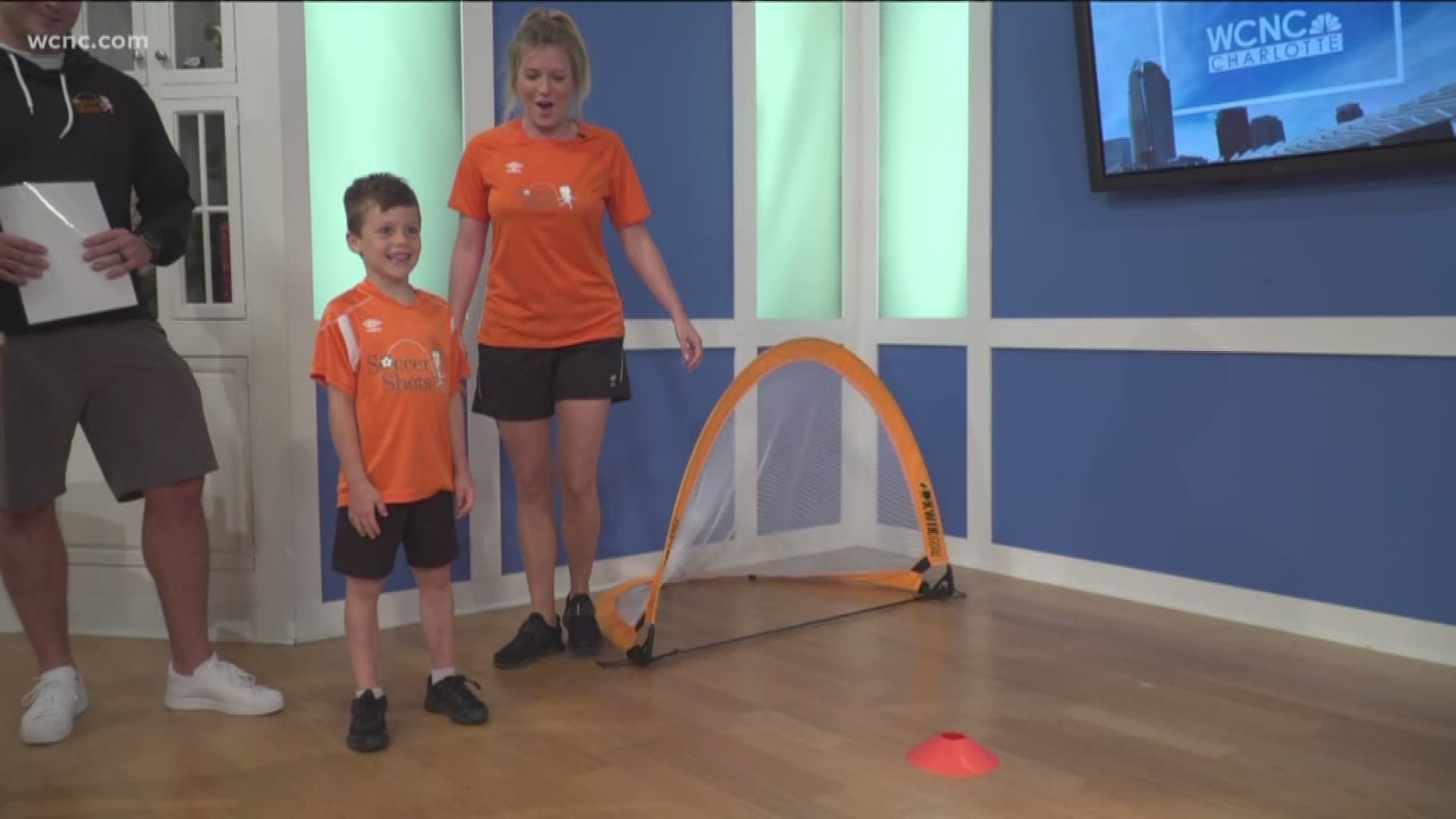 Matt Uher, Megan Peterson and Jonah Schmidt with Soccer Shots encourages Charlotte families to join its #MoveinMay initiative and incorporate daily activity into their child's schedules.