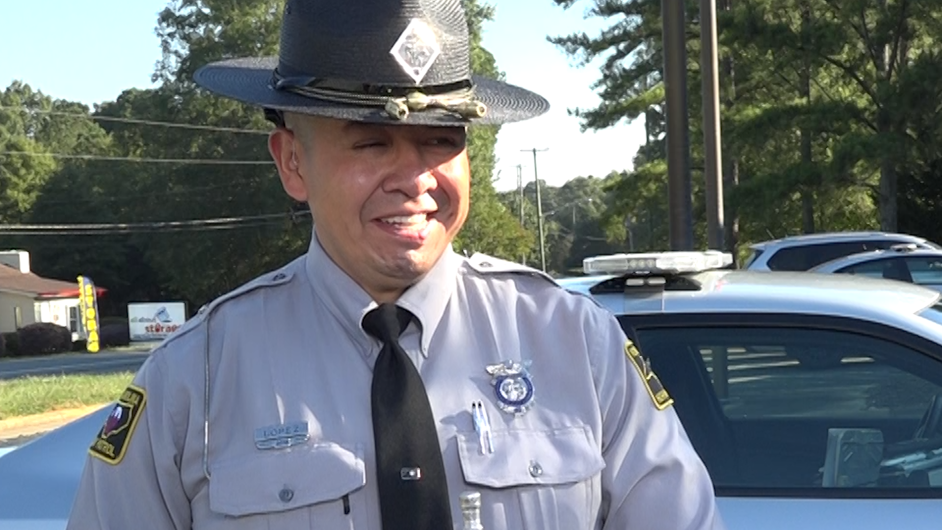 North Carolina State Highway Patrol Trooper Adolfo Lopez returned to work Monday 14 months after being injured in Charlotte.