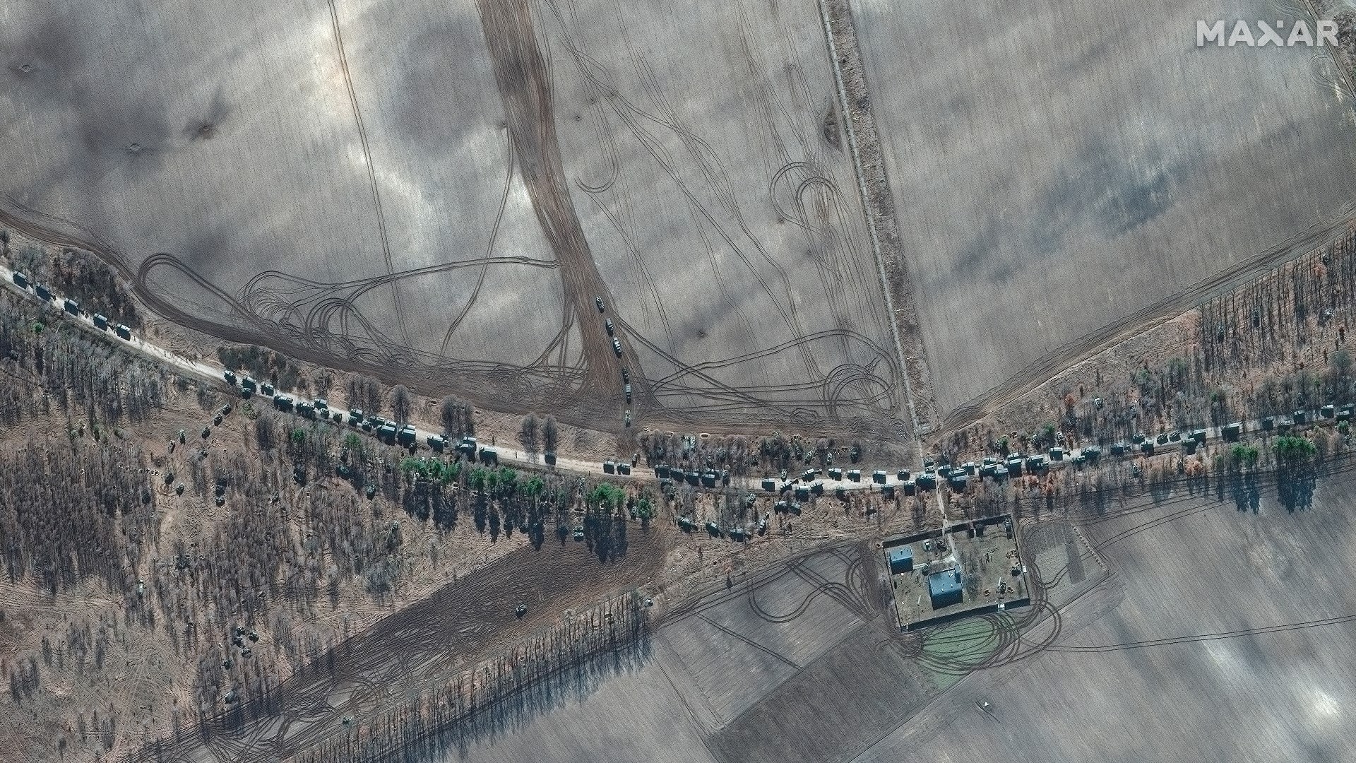 Satellite imagery spotted a massive convoy of Russian military vehicles headed toward Ukraine's capital on the same day both sides held talks.
