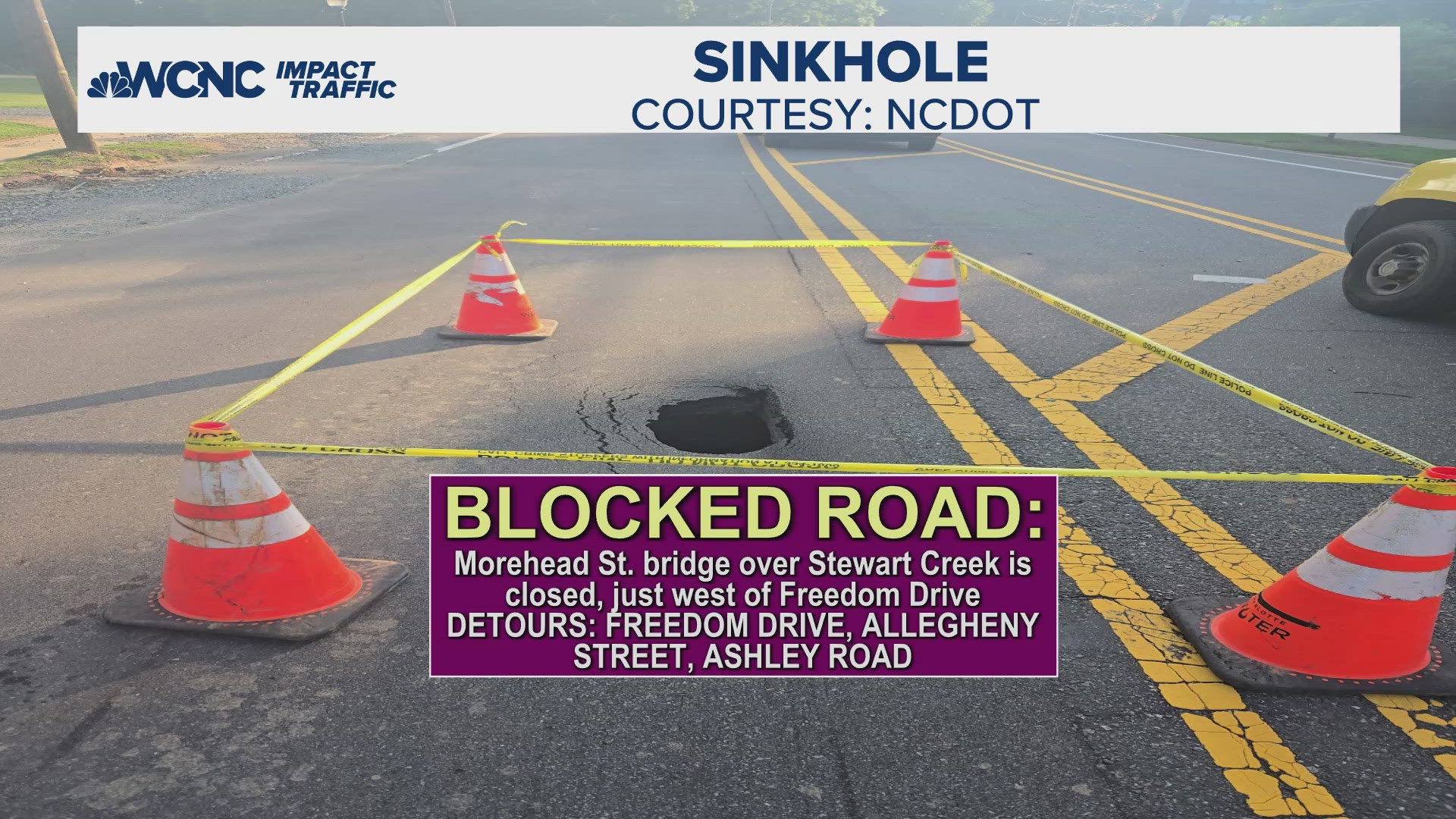 The sinkhole has closed West Morehead Street near Freedom Drive.