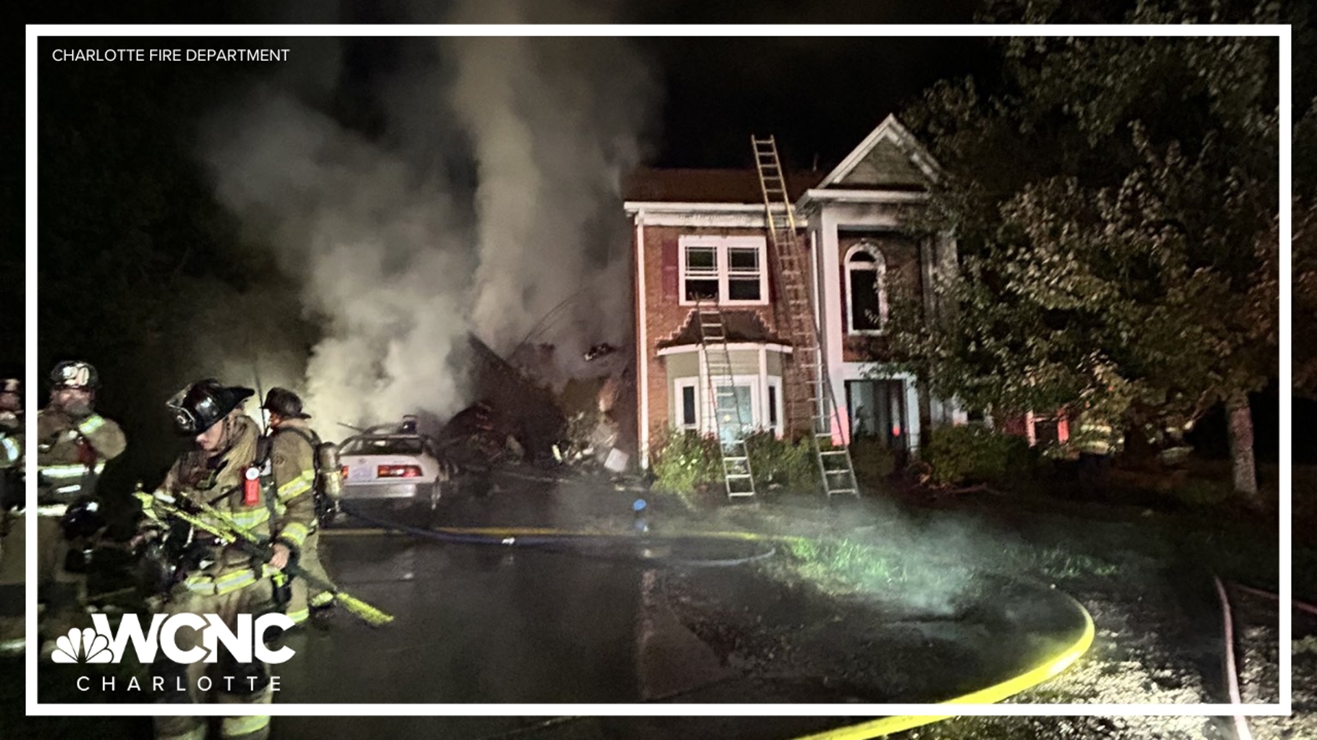 A Charlotte firefighter was rushed to the hospital after a large overnight house fire in a Blakeney neighborhood, the Charlotte Fire Department said.