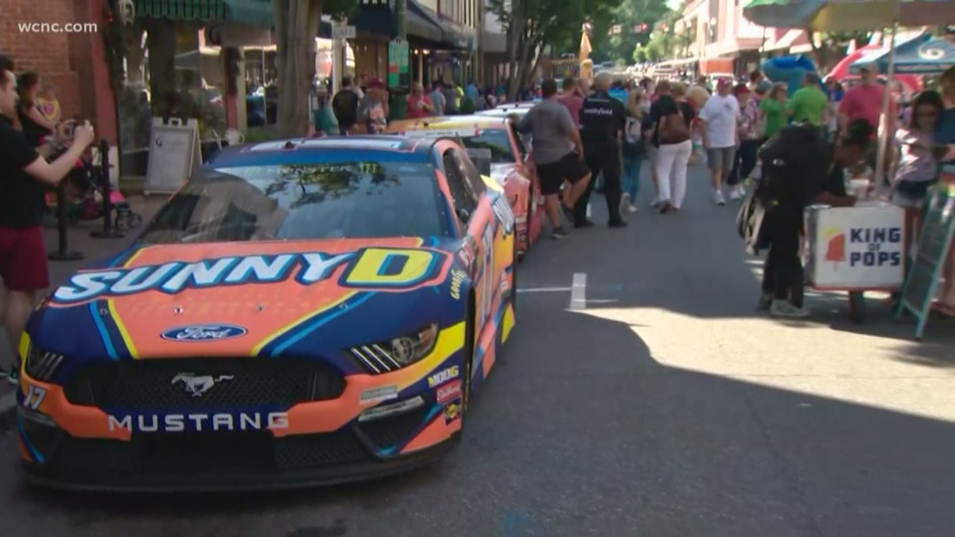 NASCAR fans lined the streets in downtown Concord to catch a glimpse of dozens of NASCAR Cup's Car Hauler trucks ahead of this weekend's big race.