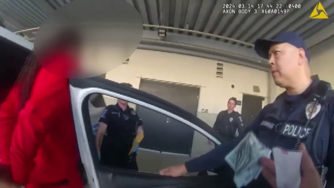 CMPD shares video of officer stealing money during arrest | wcnc.com