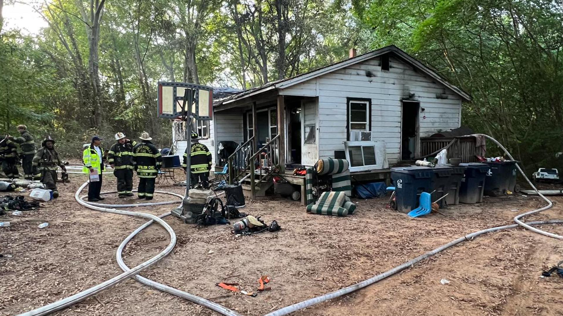 Firefighters rescue person from burning home in Huntersville | wcnc.com