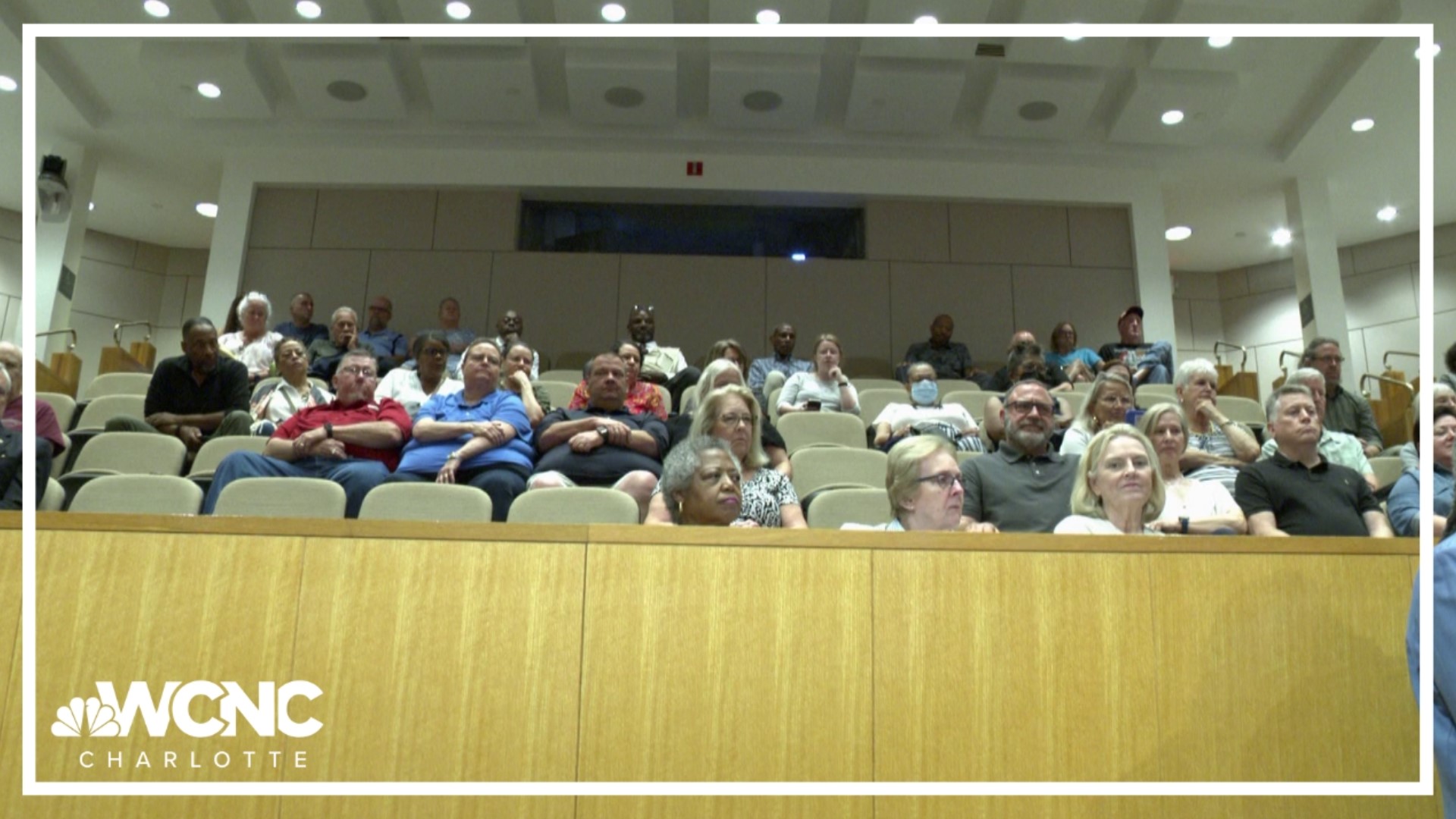 Hundreds of retirees are pushing back, urging Mecklenburg County to honor the longstanding deal.