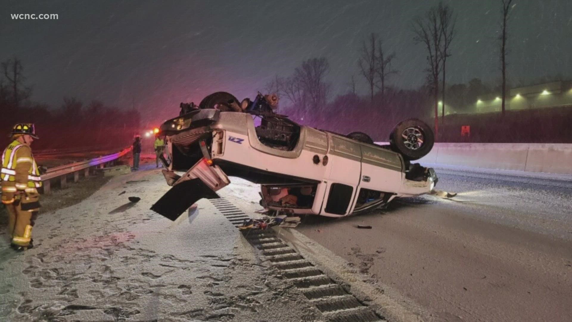 Mooresville firefighters said a truck overturned on an icy I-77 early Sunday as the winter storm moved into the Carolinas.