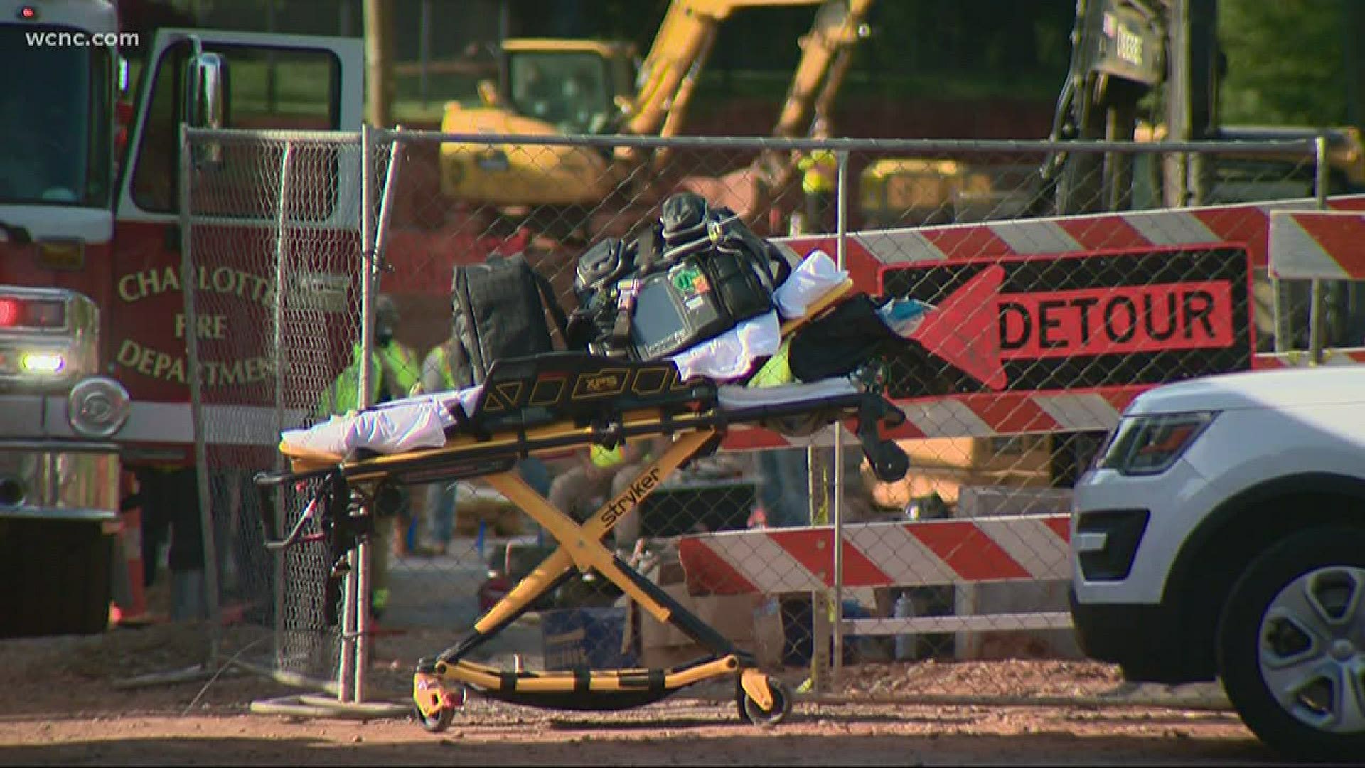 Officials say a person got stuck in a confined space at the construction site and died.