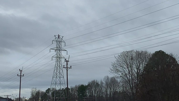 Person stuck on transmission tower along Woodlawn Road