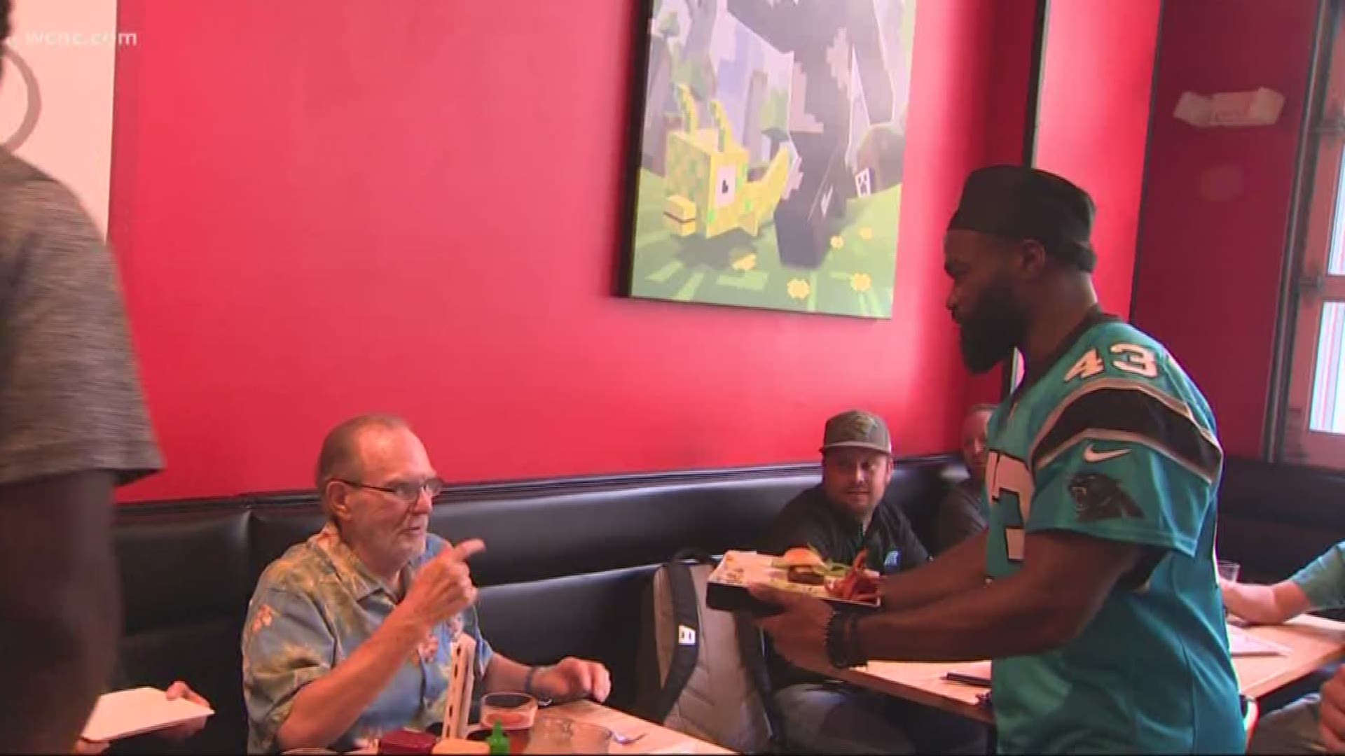 Panthers running back Fozzy Whittaker hosted an event at Cowfish on Tuesday night to benefit the victims of Hurricane Florence