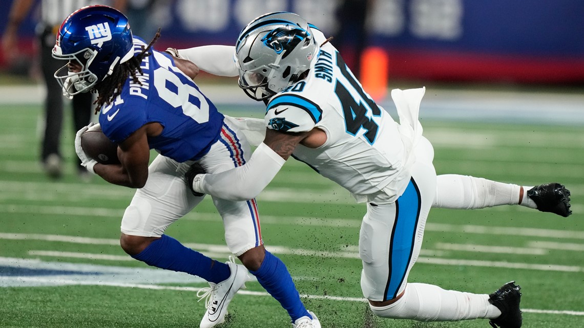 New York Giants defensive tackle Jordon Riley (95) leaves the field after  an NFL pre-season football game against the Carolina Panthers on Friday,  Aug. 18, 2023, in East Rutherford, N.J. (AP Photo/Rusty