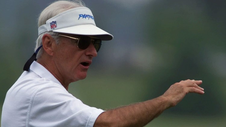 Carolina Panthers coach George Seifert, right, talks with team owner Jerry  Richardson before the start of the Panthers' game against the New York Jets  in Charlotte, N.C., Sunday, Oct. 28, 2001. Seifert