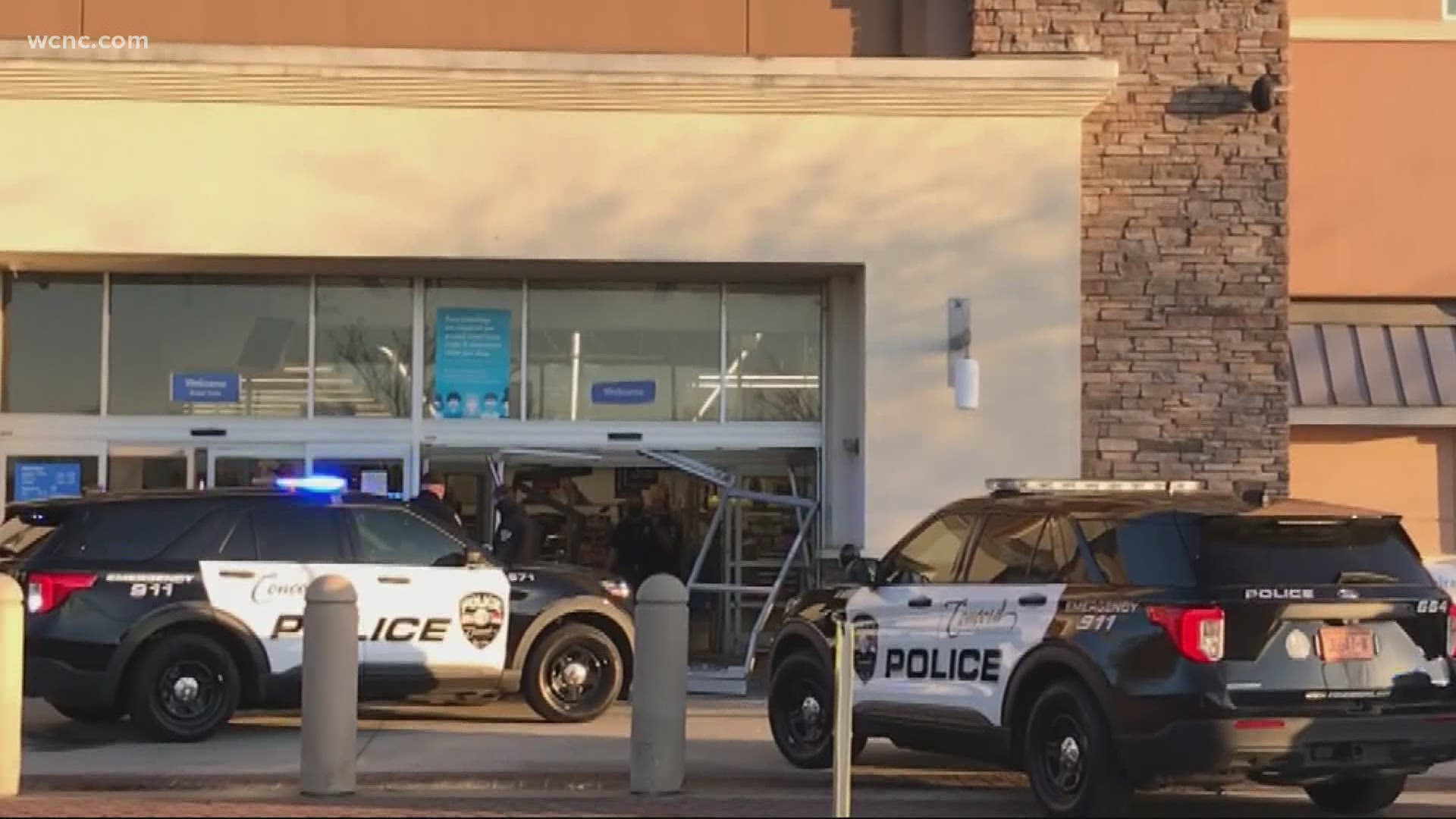 Police said one person is in custody after driving a car into the Walmart store on Thunder Road in Concord Friday morning.