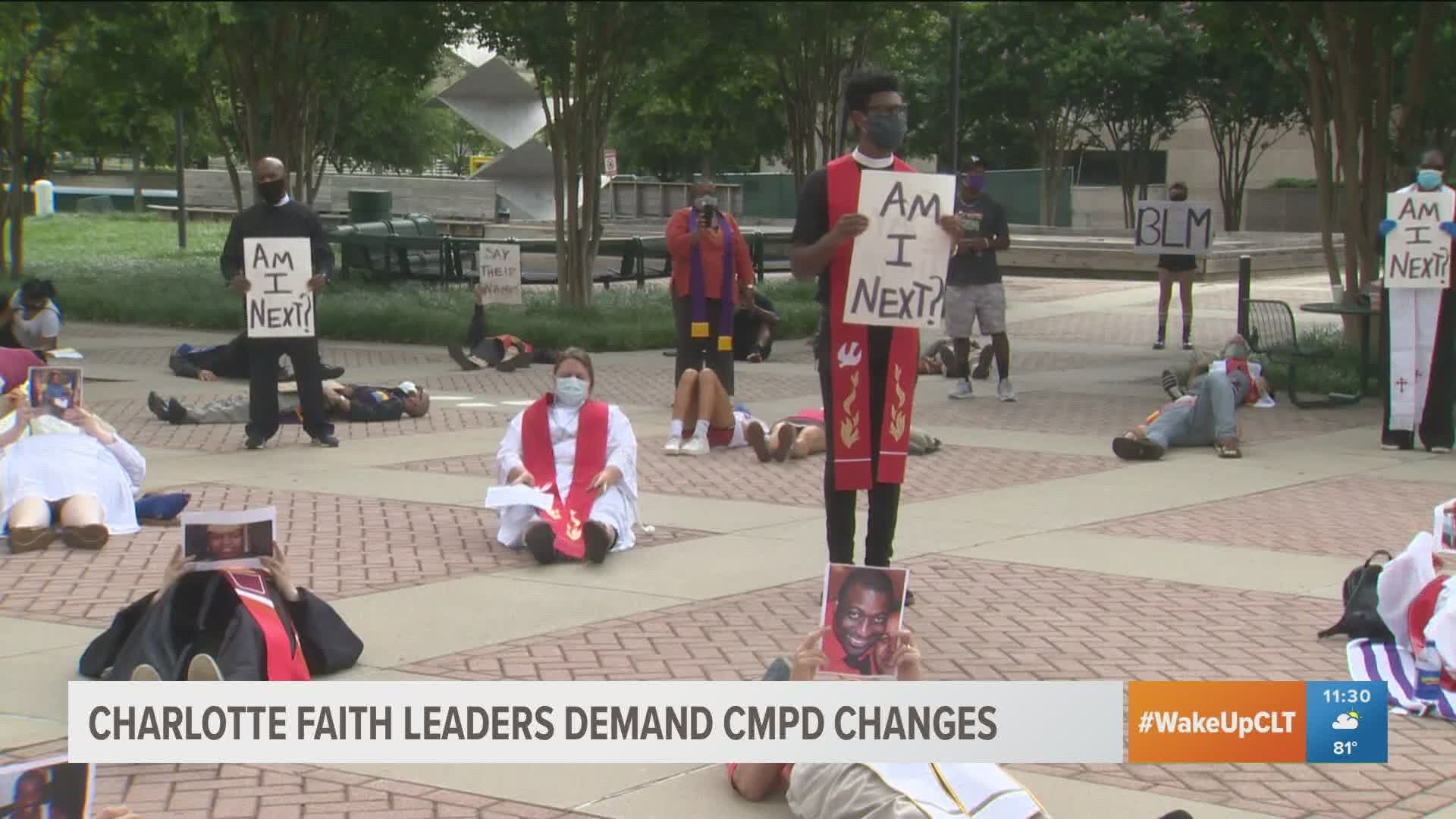 Faith leaders across Charlotte brought a list of demands to the government center Monday and staged a "die-in" protest calilng for change in CMPD.