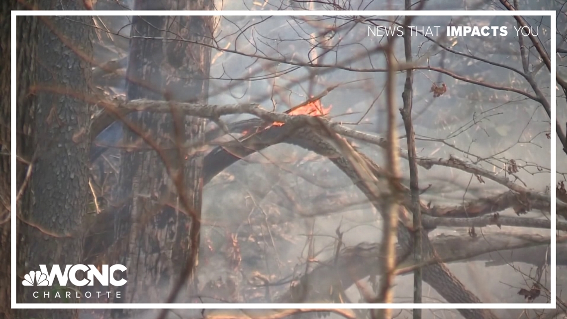 Crews continue to monitor large wildfires in Polk County | wcnc.com