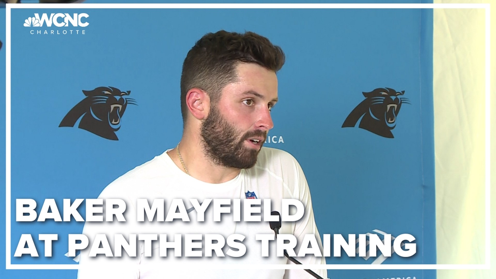 Quarterback Baker Mayfield updates reporters on the progress of the Carolina Panthers' training camp in Spartanburg, South Carolina.