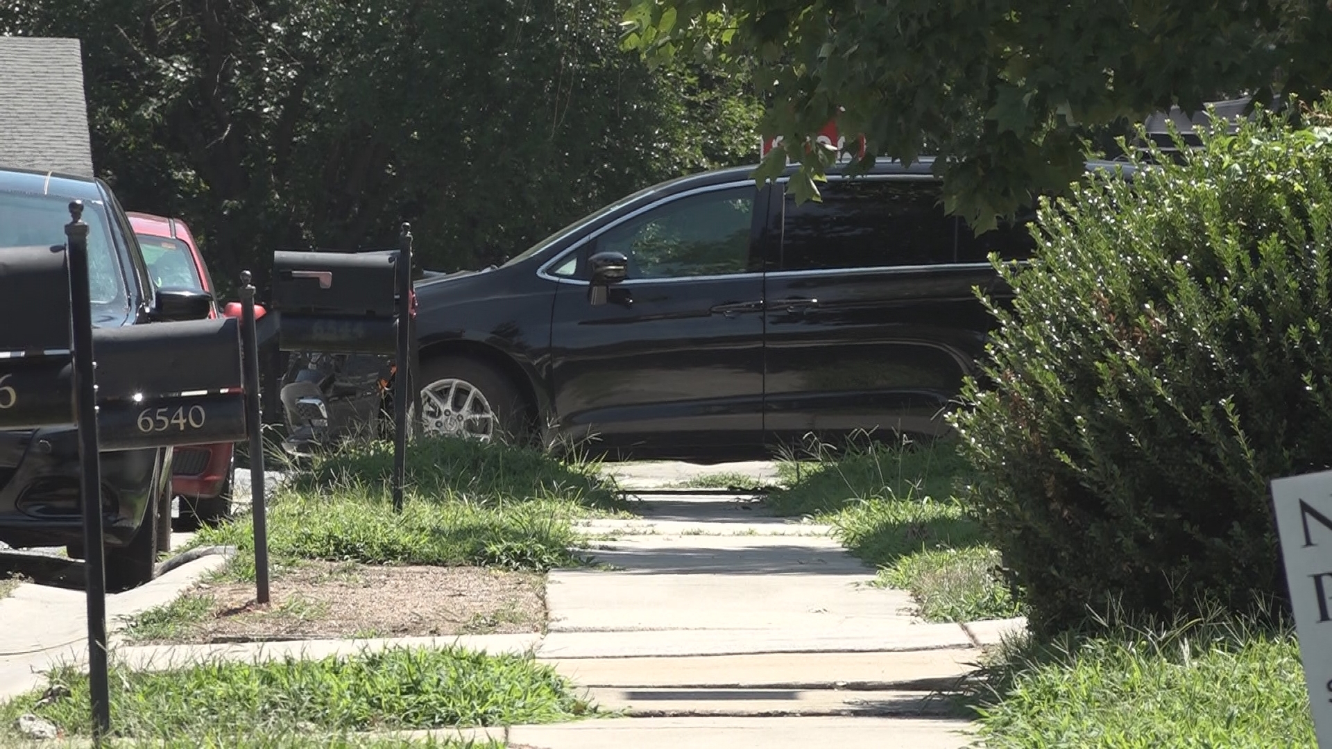 Parking in a Charlotte driveway while on the sidewalk will soon lead to a $100 fine