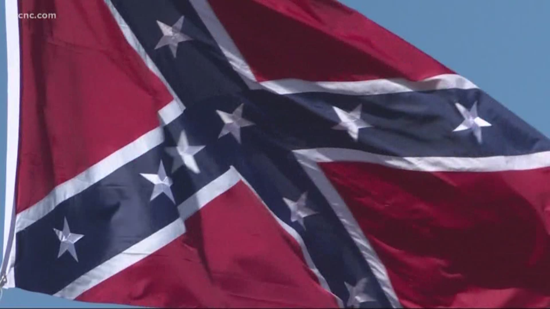 Confederate flags flying over local highways