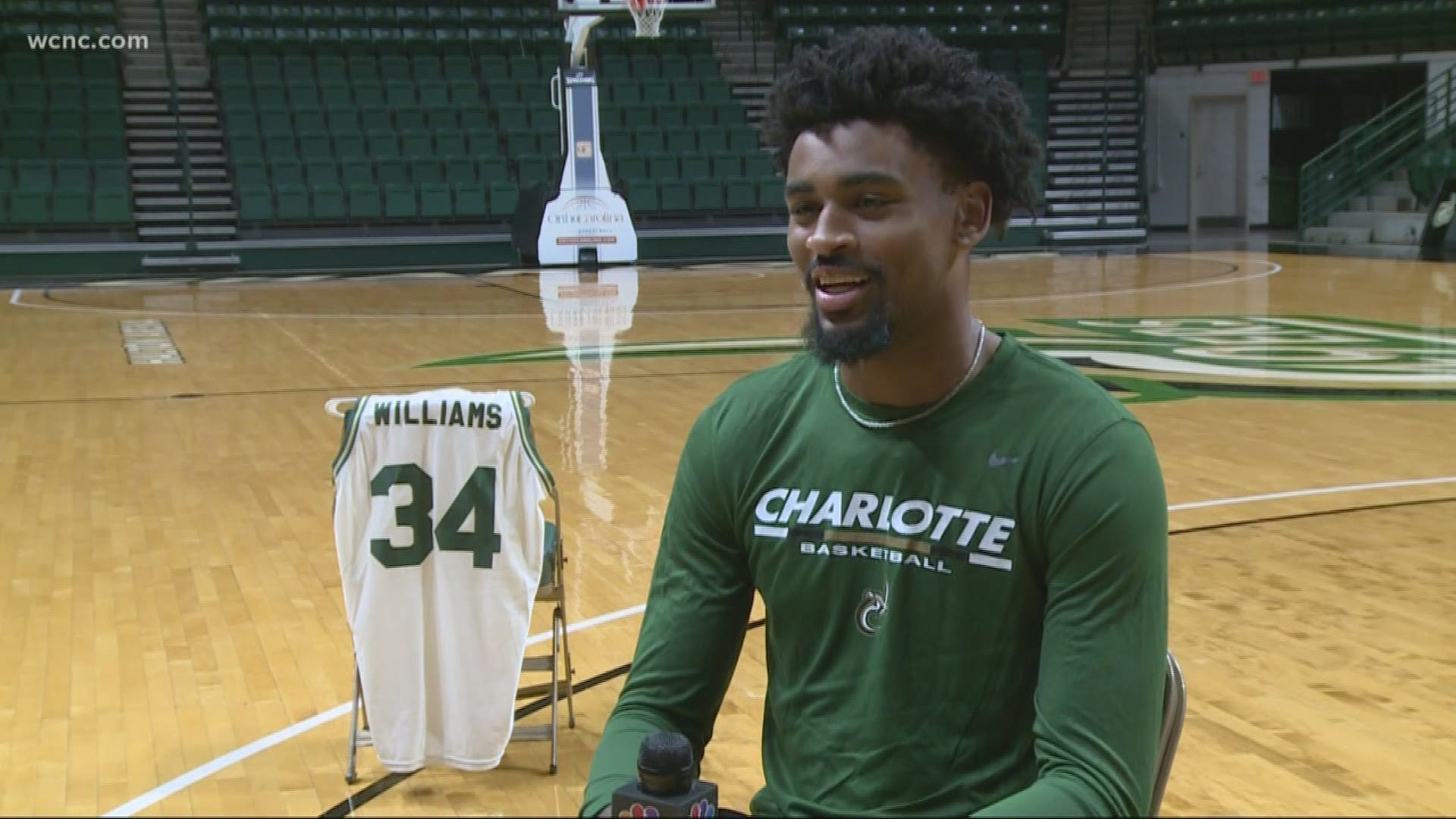 A UNC Charlotte freshman is following in his late father's footsteps by playing on the UNCC basketball team. His father was a fixture at the university.