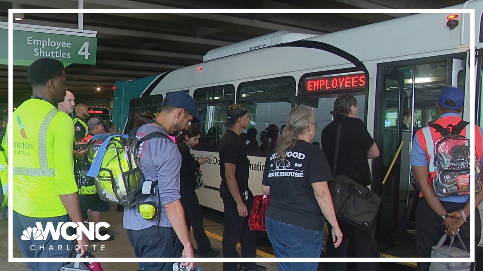 Airport employees say they sometimes have to wait nearly an hour to get on the shuttle that takes them to the employee parking lot.