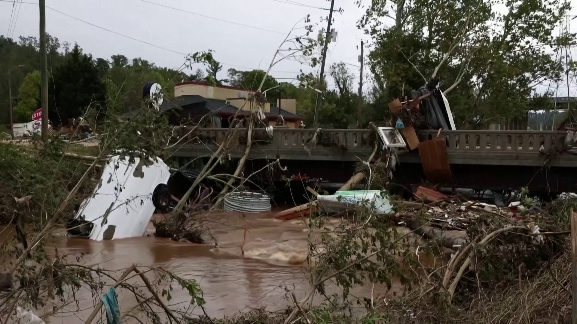 A volunteer fire department near Asheville says one of its own members died while conducting a rescue operation in the wake of Helene last week.