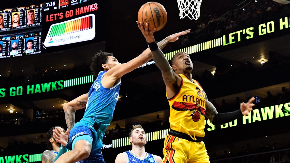 Short-handed Hornets lean on 3-pointers, top Hawks 130-127