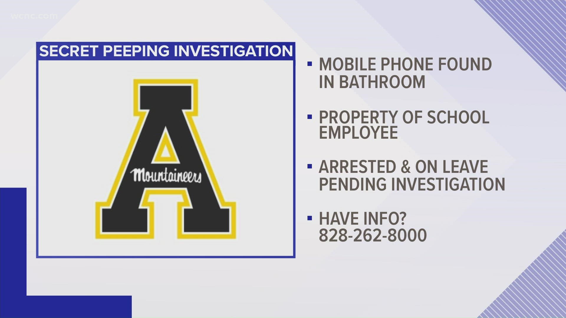 A janitor at Appalachian State University is facing peeping charges after a cell phone was found pointing into a bathroom at a residence hall in October.