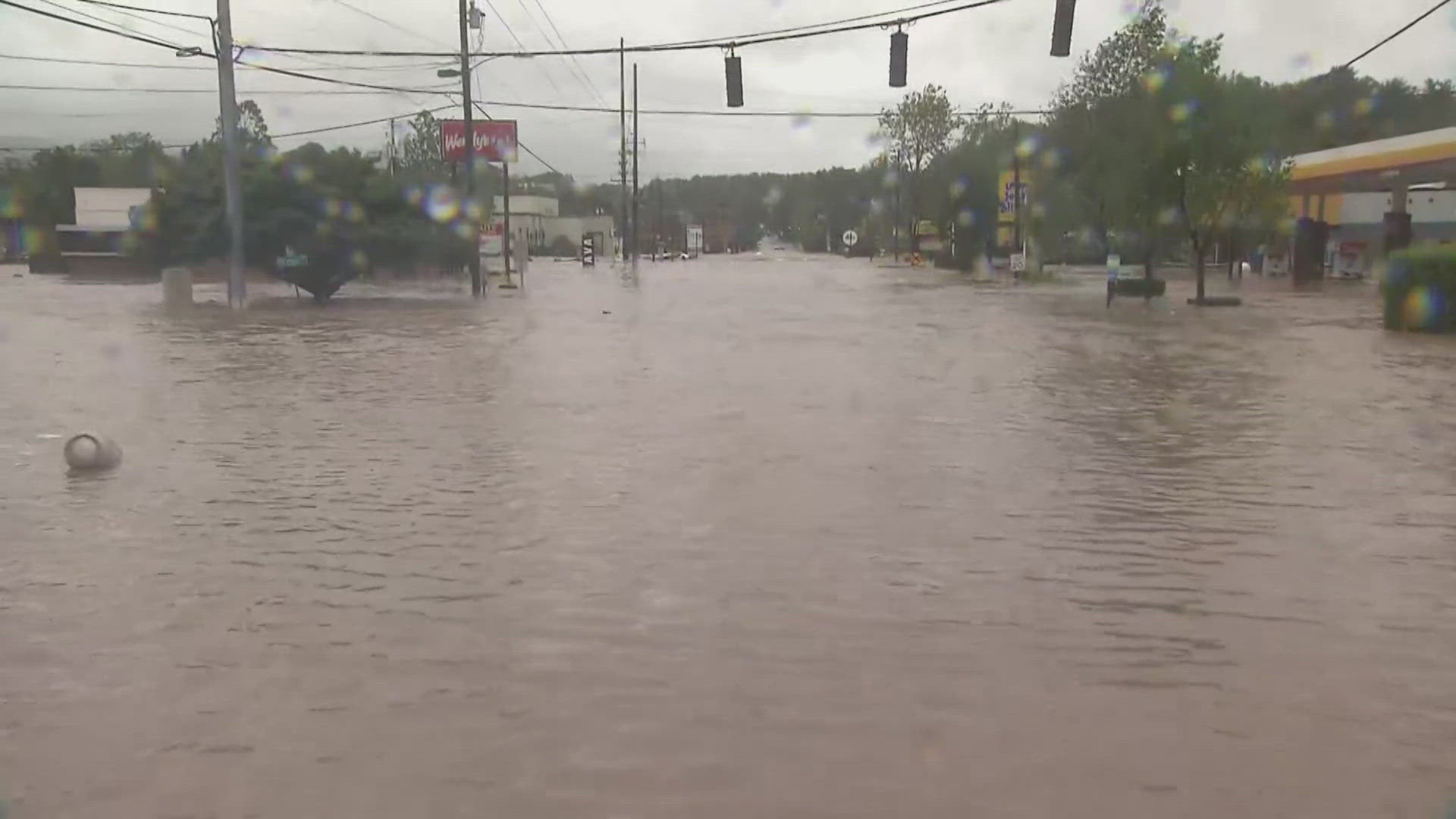 Helene impacts: The Swannanoa River has risen in Asheville causing massive flooding in the area Friday.