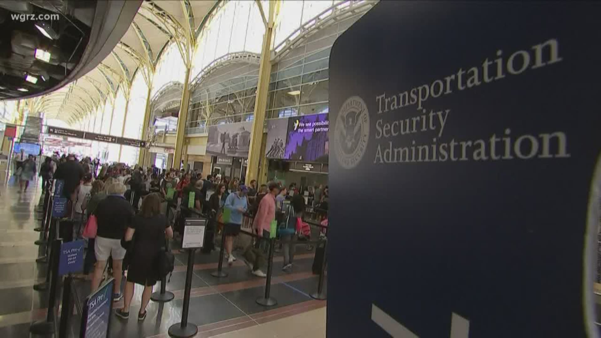 TSA agents reminding travellers about Real ID