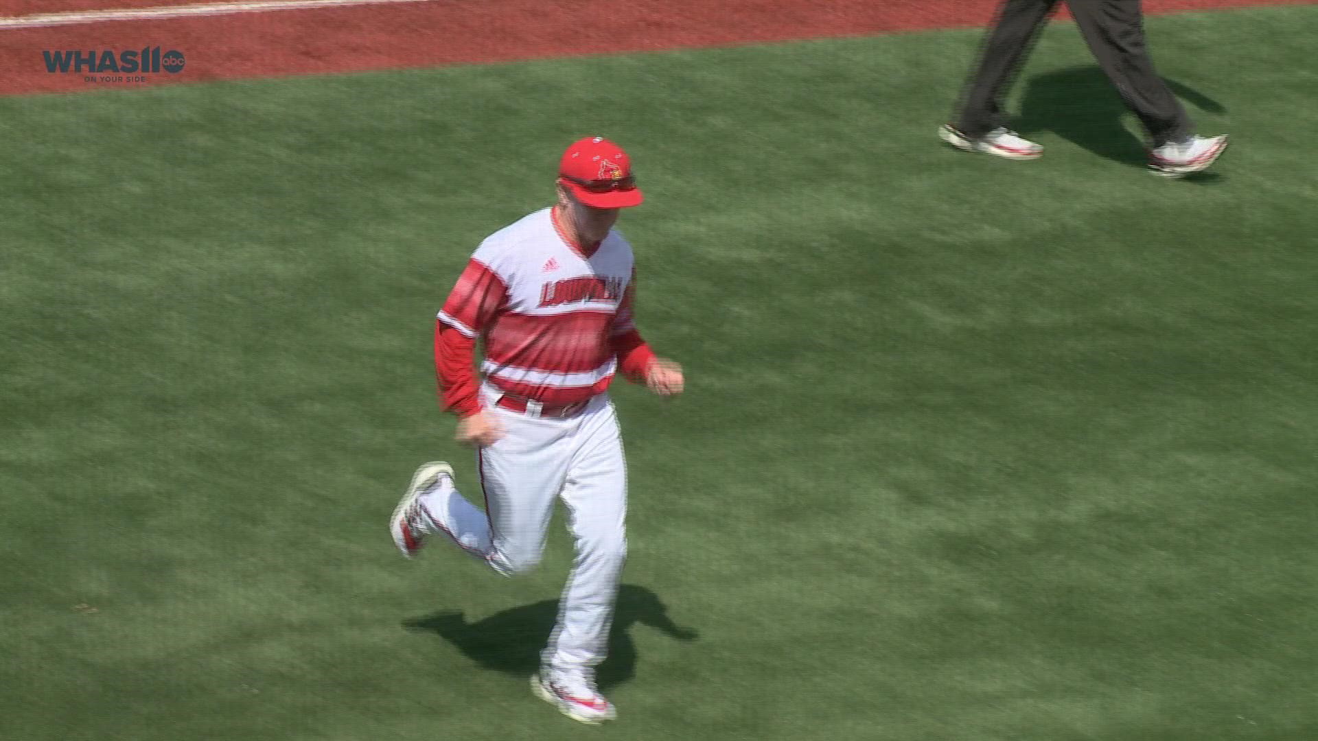 Fans leave Jim Patterson Stadium after a bomb threat paused the baseball game between Louisville and North Carolina on April 10, 2022.