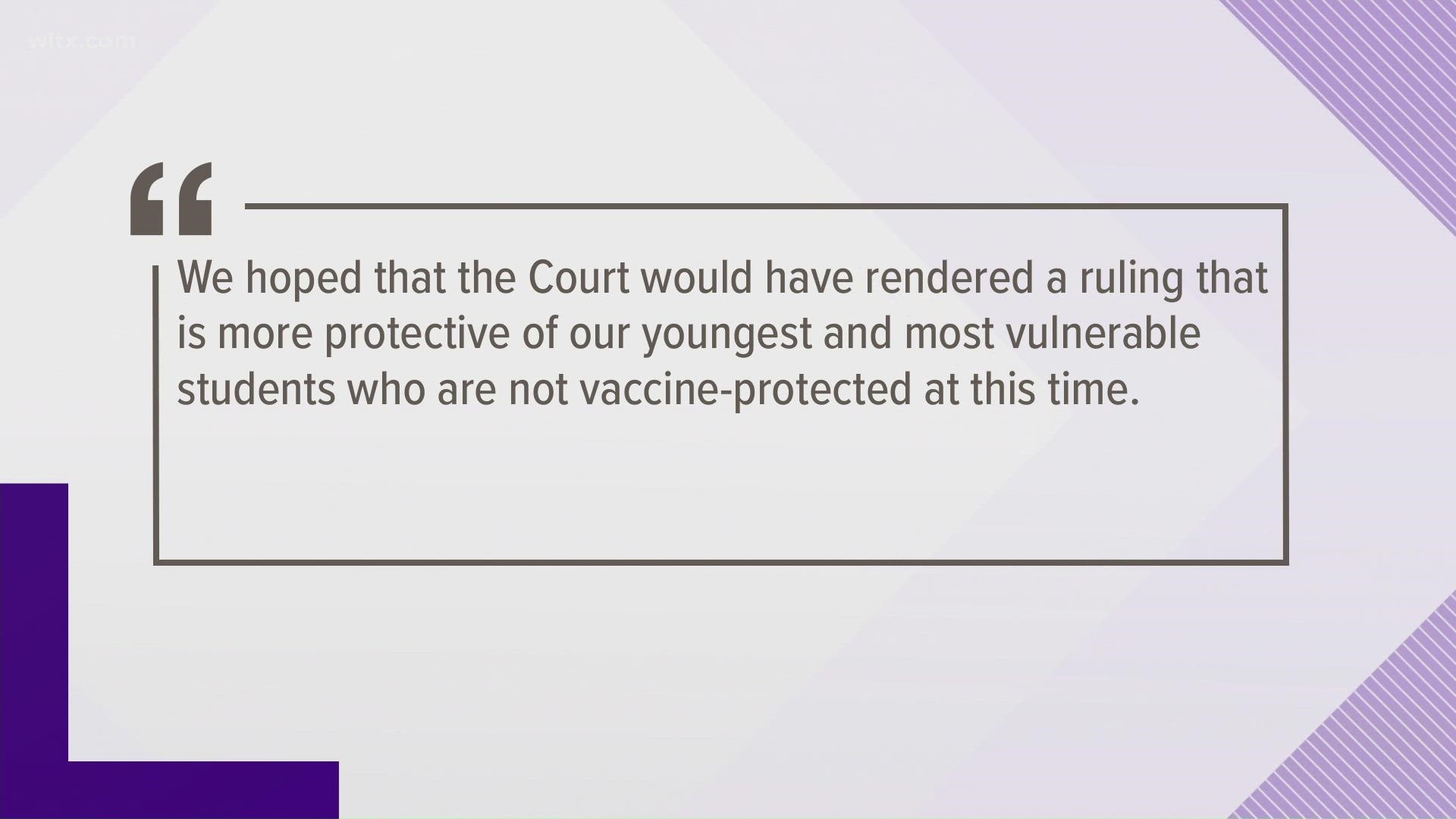 The district says it's waiting for a separate ruling from the state supreme court.