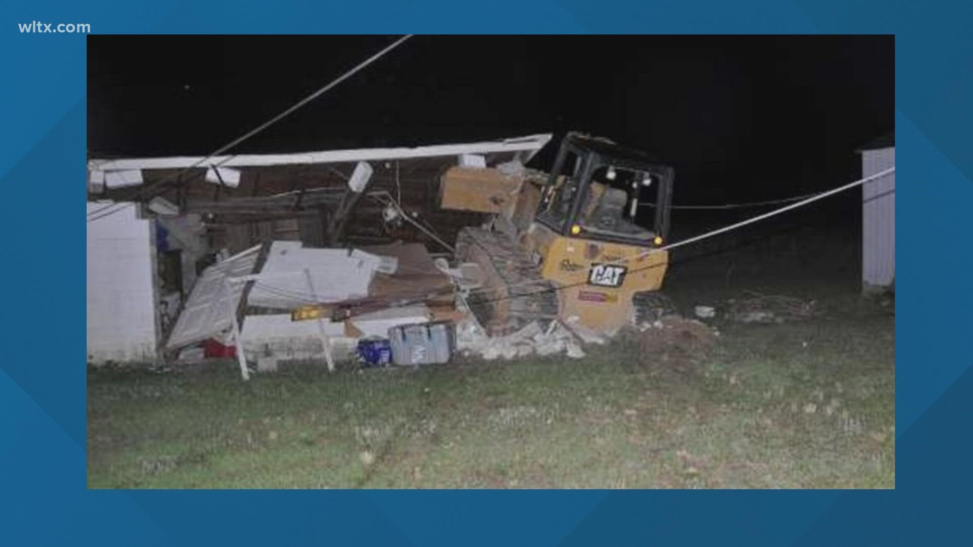 A 41-year-old man is facing charges after Newberry County deputies say plowed a bulldozer into a shed as part of a revenge plot.