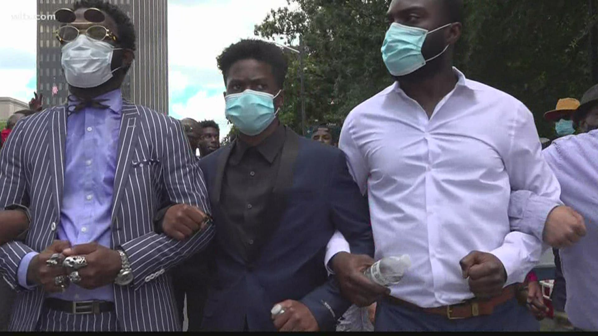 Hundreds and hundreds of people walked from MLK Park to the Statehouse dressed in their Sunday best to send a message