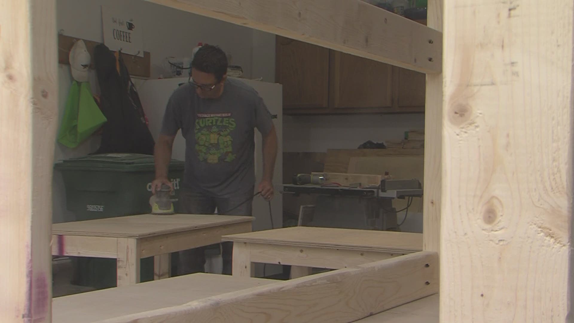 Ankeny teacher using his side business to build desks for 