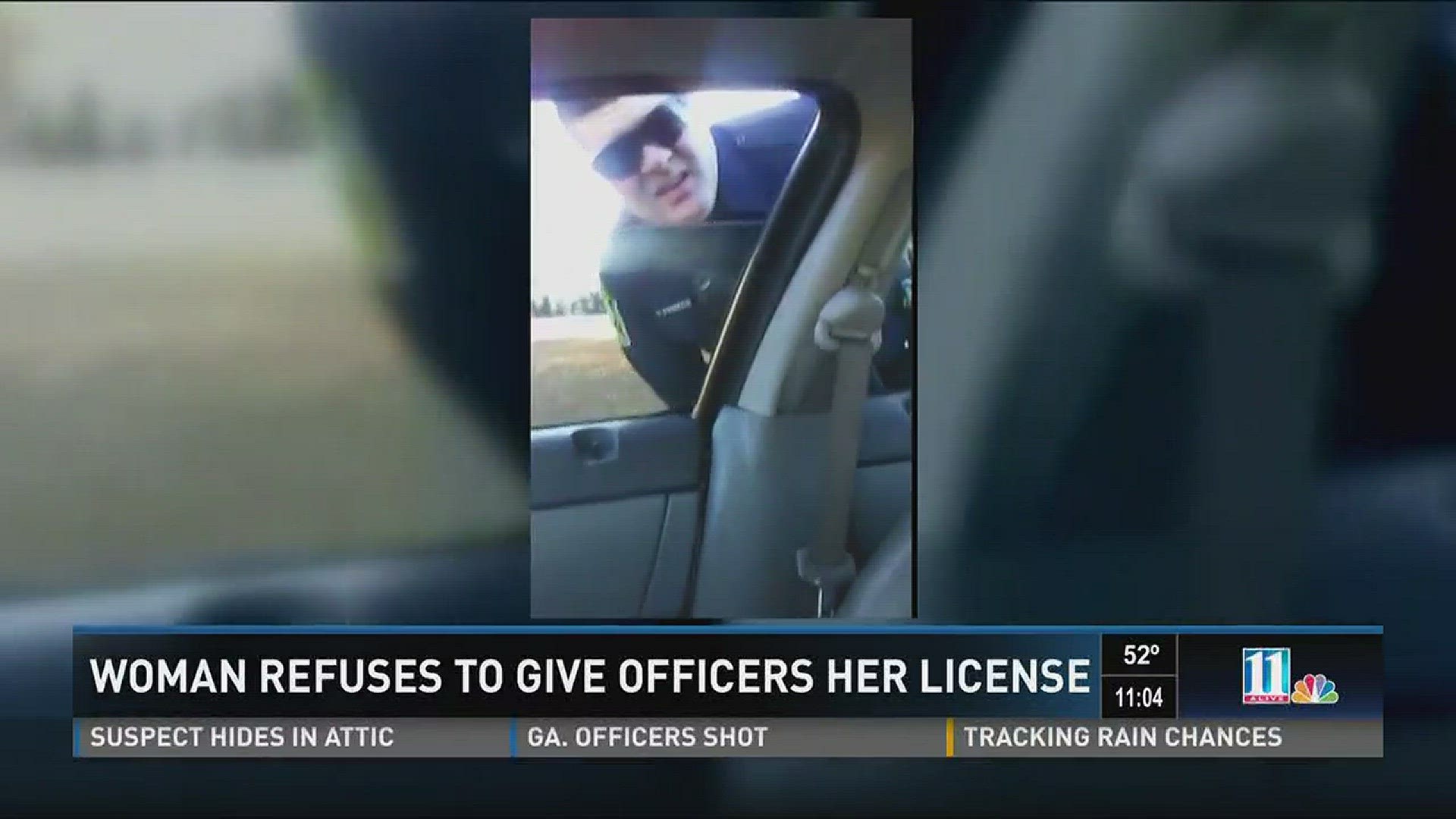 Police smash car window after woman refuses to give them her drivers ...