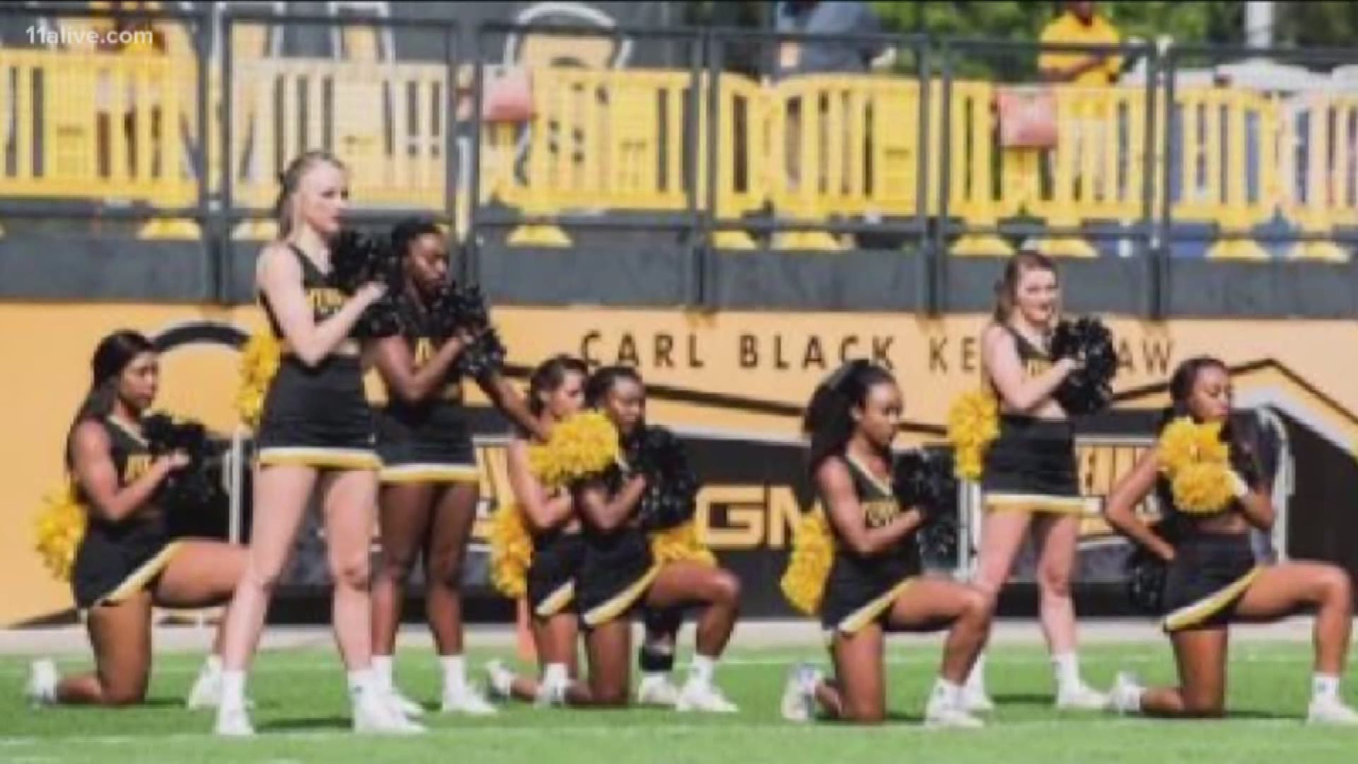The five cheerleaders stirred controversy last year when they knelt before the start of one of KSU's home football games on Sept. 30. 